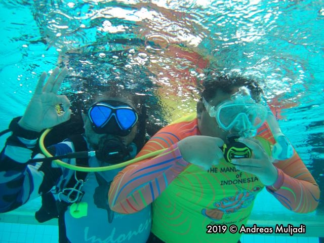 Breathing the Scuba Air by Octopus's Hose