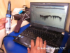 The computer is reading the temperature data The computer is reading the temperature data