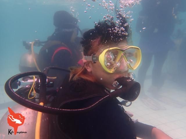 in scuba set underwater